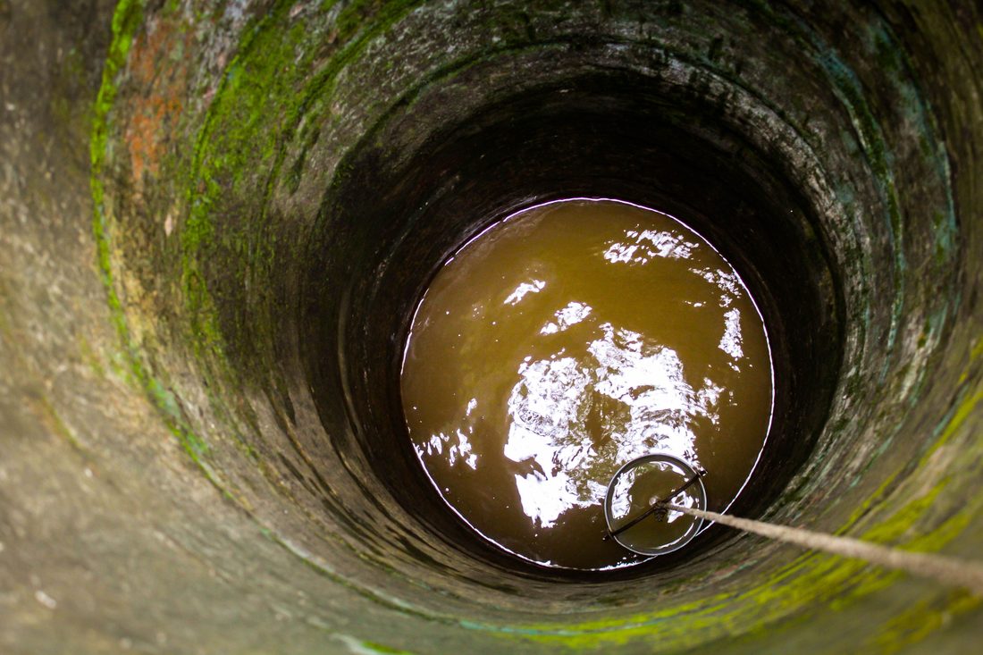 Looking down into a residential cesspool that needs pumping in Suffolk County, NY